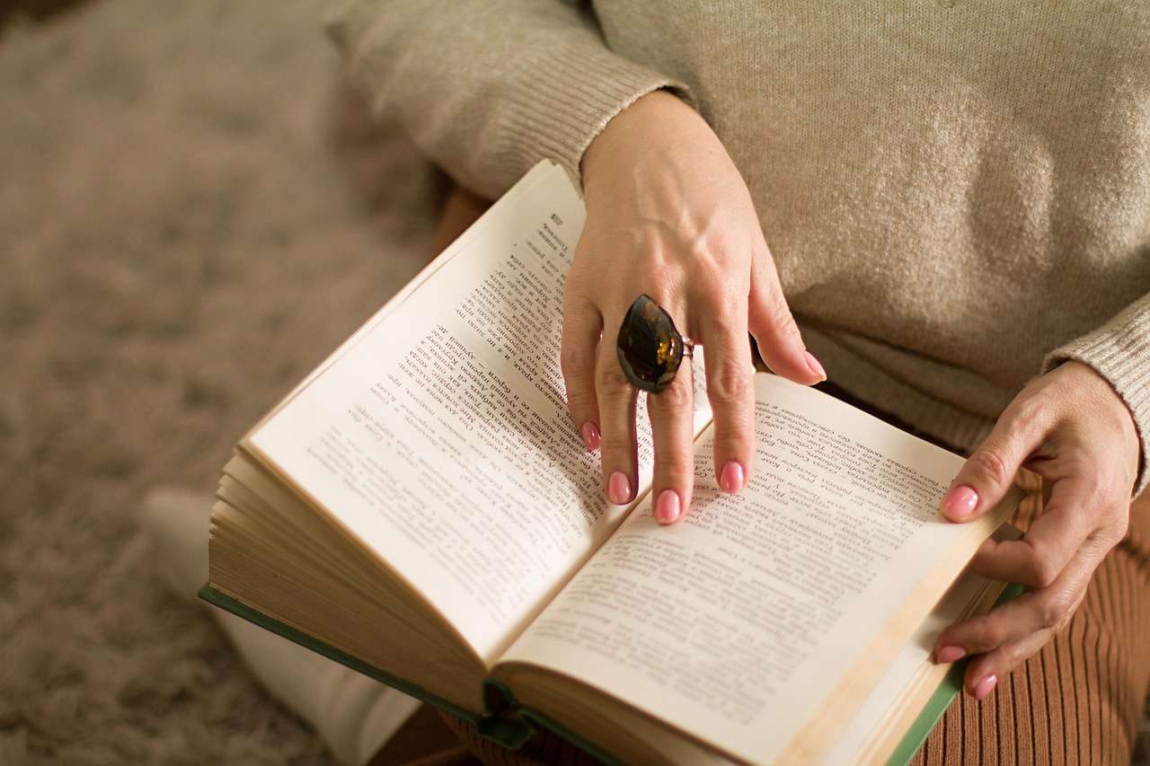 woman reading book