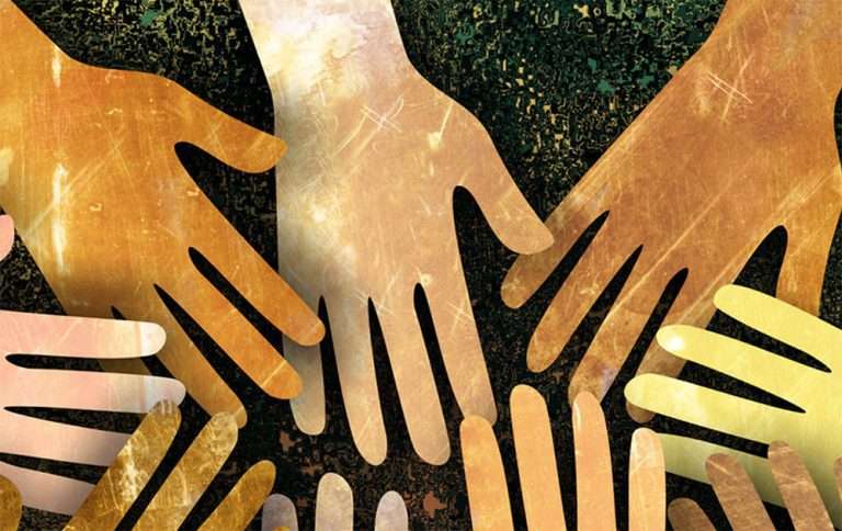 Cut out of hands with different skin colour