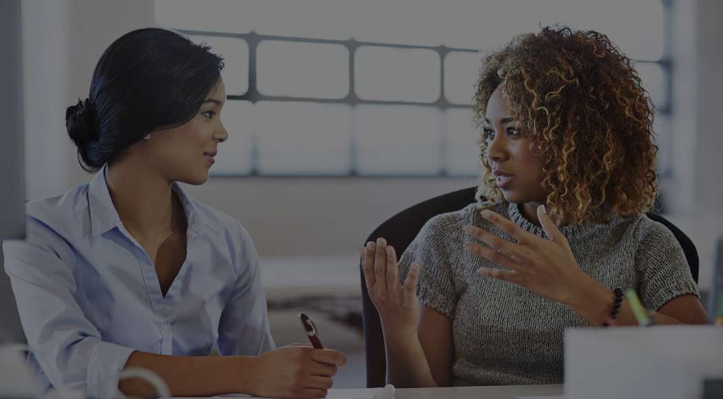 2 women in conversation