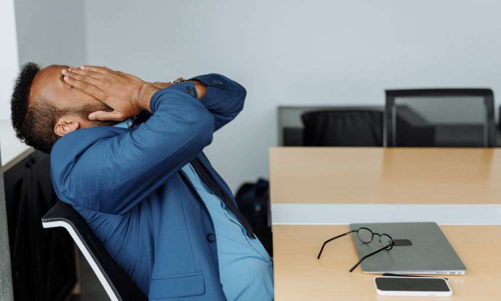 stressed man at desk