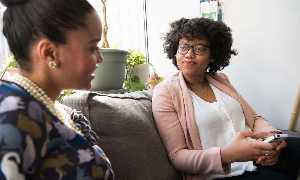 two women in discussion